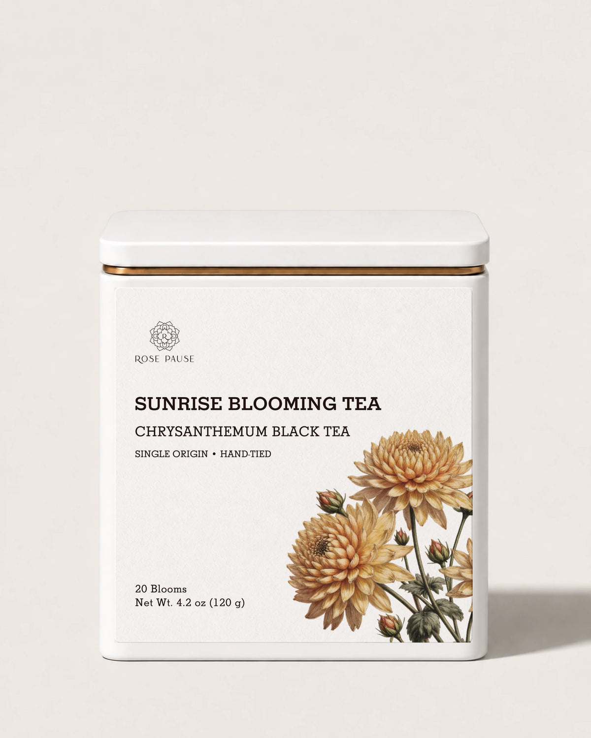 Rose Pause Sunrise Blooming Tea in a white tin labeled Chrysanthemum Black Tea, containing 20 blooms.